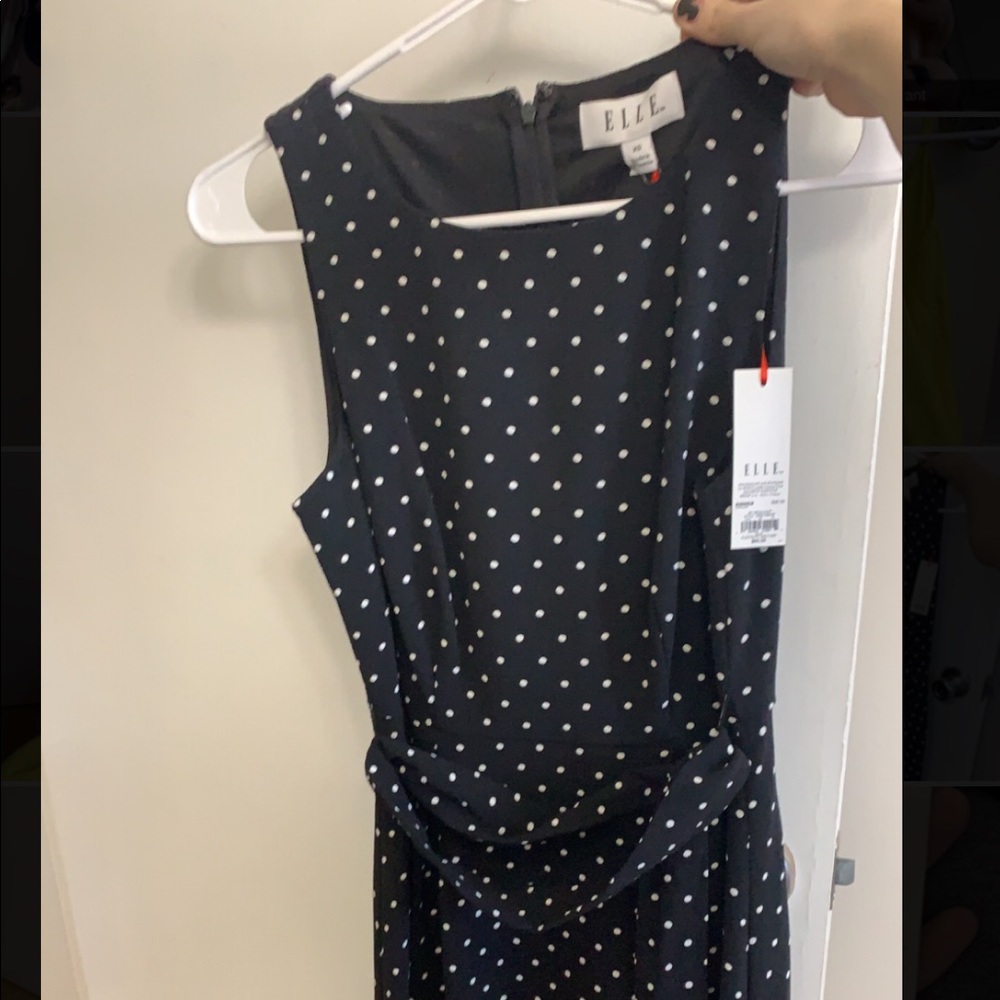 black dress with white polkadots, xs but runs big